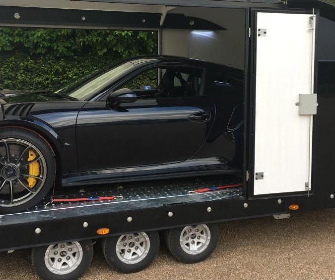 Black sports car in our truck