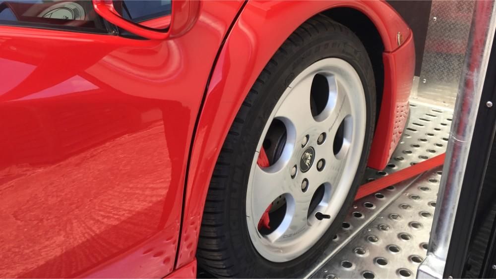 red sports car wheel