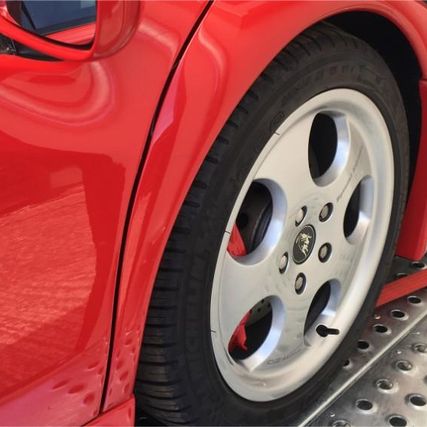 red sports car wheel