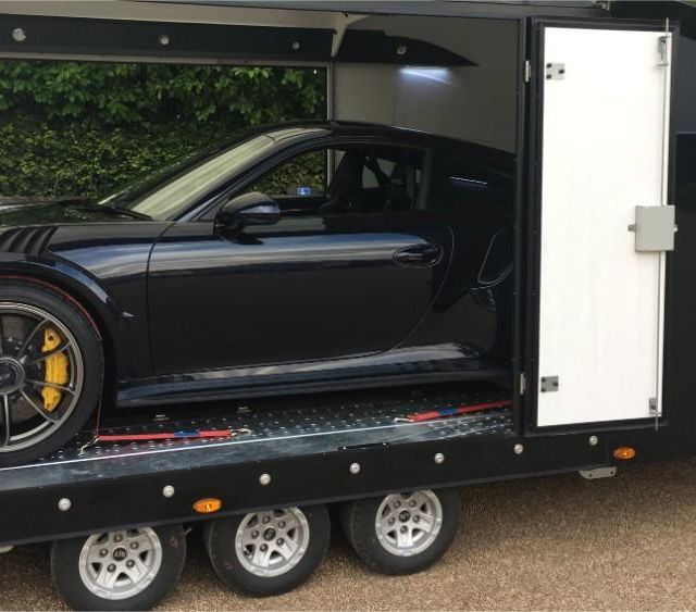 Black sports car in our truck